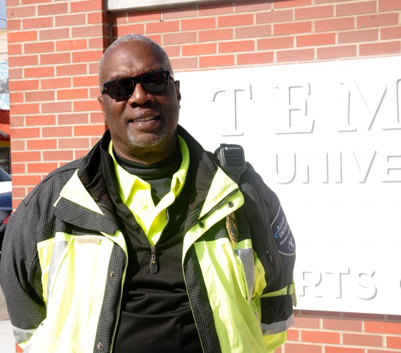 Mike Brown works security detail at the new Temple Sports Complex on Girard Avenue in North Philadelphia. DAVE FREDERICK PHOTO